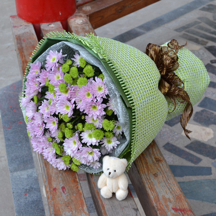 flowers with teddy bear